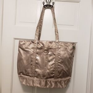 The SAK Goldtone Vinyl Shoppers Tote, Zip Close